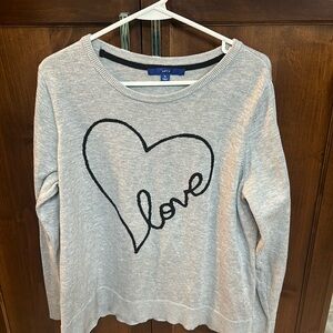 Women’s sweater size L.